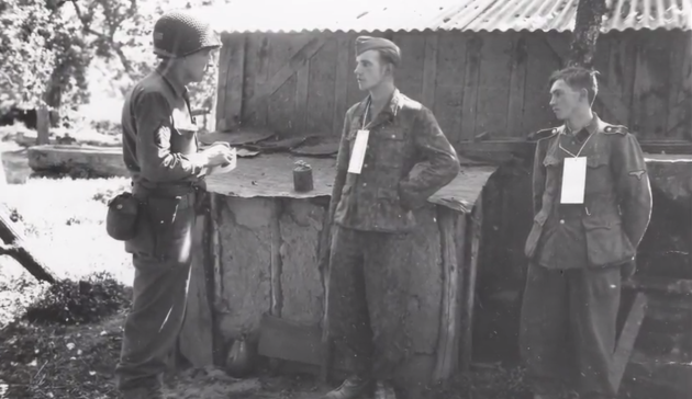 Martin Selling questions German SS captives near the front in France, 1944